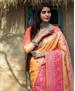 Picture of Good Looking Orange Silk Saree