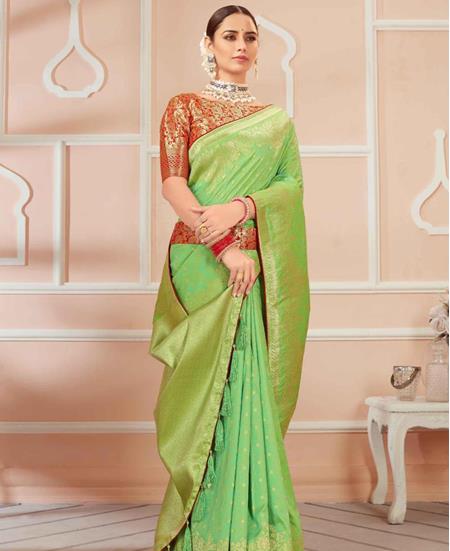 Picture of Shapely Parrot Green Silk Saree