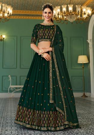 The dramatics of the peach to bottle-green shaded lehenga is emphasized by  the delicate zigzag cutdana and pearl embellishments. Putting it… |  Instagram